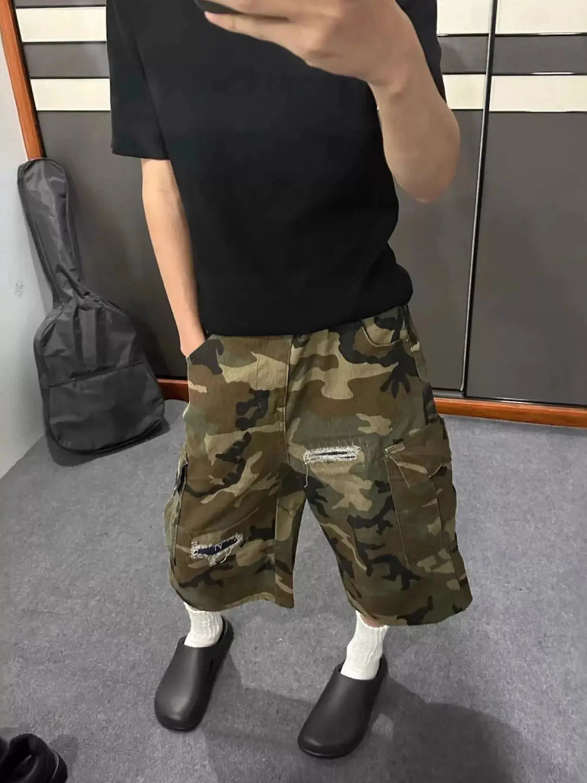 Men's plus-size camo cargo denim shorts with distressed details