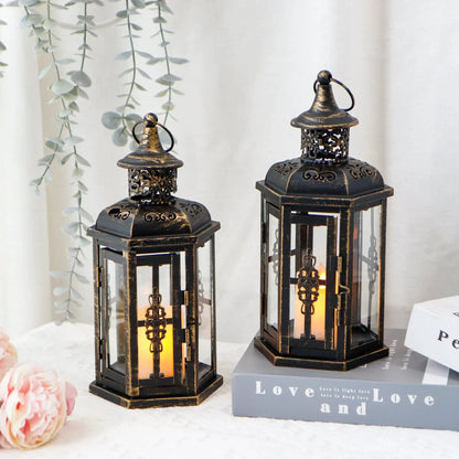 Decorative candle lanterns, 10-inch high vintage metal lanterns (set of 2) with black distressed finish and cutouts.