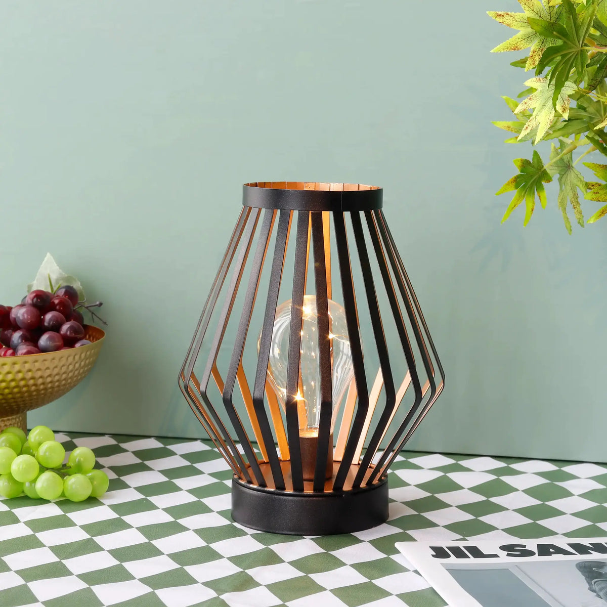 8.7H Diamond battery-powered table lamp by JHY DESIGN; black metal frame with copper interior