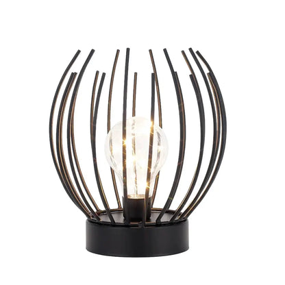 7-inch tall battery-powered table lamp with a black metal wire cage surrounding a clear bulb