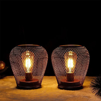 6.7-inch tall battery-powered outdoor table lamp set (2) with bronze wire-mesh cages and warm Edison bulbs